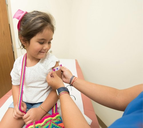 Child receiving care in pediatric nephrology unit at Bansal Hospital, Bhopal